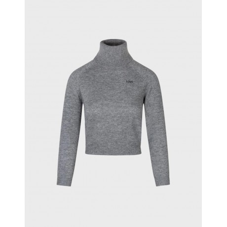 Maglia collo alto in lana merinos con maanica lunga con la scritta LOVE