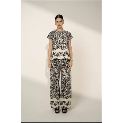 Blusa in tessuto stampato linea morbida giro collo,manica corta