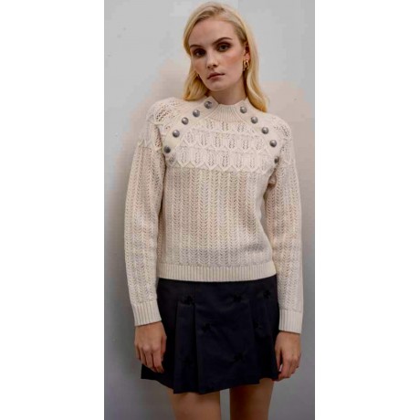 Maglione in lana con lavorazione traforata.Collo alto rotondo con dettagli di bottoni decorativi sulle spalle.Maniche lunghe con