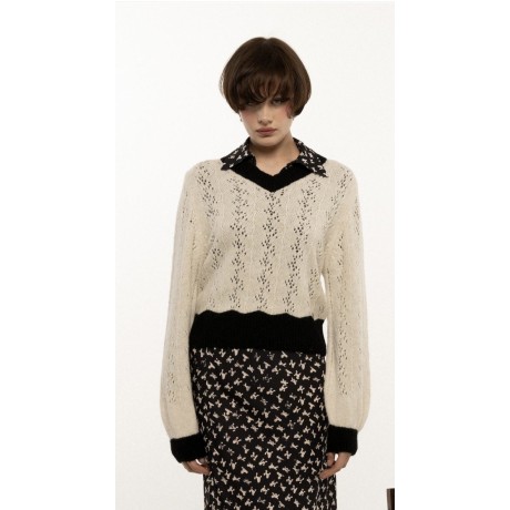 Cozy and warm: indossala con un abito leggero.