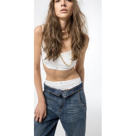 Jeans cinque tasche in denim di cotone stretch dalla linea ampia,chiusi con zip nascosta e bottone a chiodo..